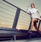 Woman running on bridge